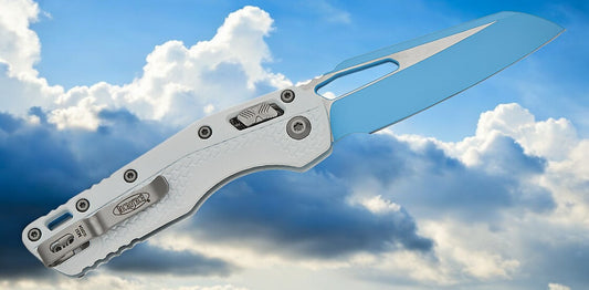 Microtech 210T-1PMCWH-Y7 MSI RAM-LOK Manual Folding Knife 3.88" Bohler M390MK Sky Blue Cerakote Modified Sheepsfoot Plain Blade, White Tri-Grip Injection Molded Polymer Handles, Sky Blue Backspacer, AXIS/Crossbar Lock